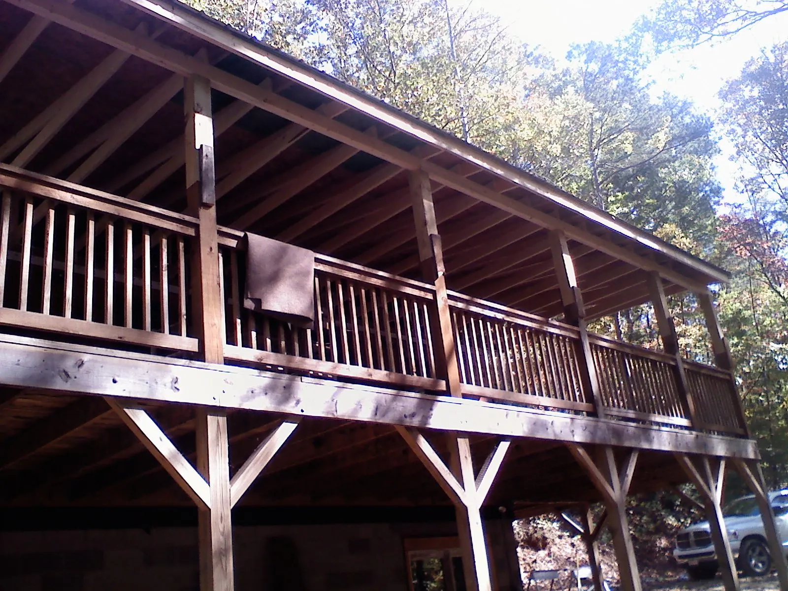 Timber framing under a new elevated porch and deck — Roof Leak Repair in Bowling Green by Roofing Brothers